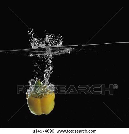 Stock Photograph - Close-up of a bell pepper underwater. Fotosearch