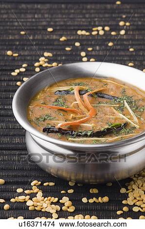 Close-up of a bowl of black lentil curry View Large Photo Image Picture - Close-up of a bowl of black lentil curry . Fotosearch