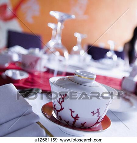 Stock Photo - Close-up of a bowl on a saucer. Fotosearch