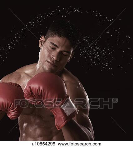 Close-up of a boxer practicing View Large Photo Image Stock Photography - Close-up of a boxer practicing. Fotosearch