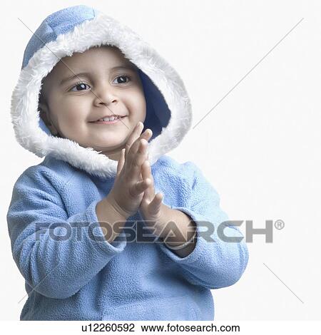 Close-up of a boy clapping View Large Photo Image Stock Image - Close-up of a boy clapping. Fotosearch