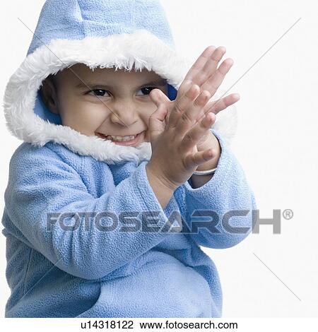 Close-up of a boy clapping View Large Photo Image Stock Image - Close-up of a boy clapping. Fotosearch