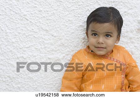 Stock Photo - Close-up of a boy looking up. Fotosearch