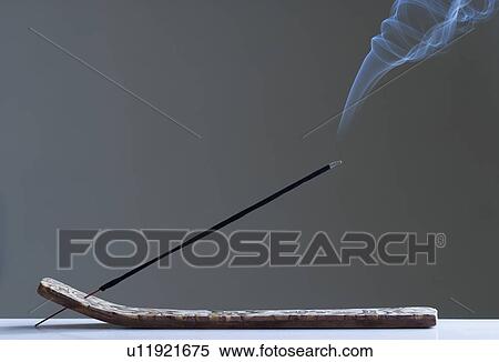 Close-up of a burning incense stick View Large Photo Image Stock Photography - Close-up of a burning incense stick. Fotosearch