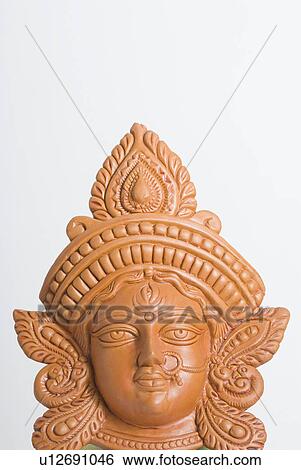 Close-up of a figurine of Goddess Saraswati View Large Photo Image Stock Photograph - Close-up of a figurine of Goddess Saraswati. Fotosearch