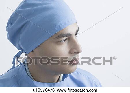 Close-up of a male surgeon wearing surgical scrub View Large Photo Image Stock Image - Close-up of a male surgeon wearing surgical scrub. Fotosearch