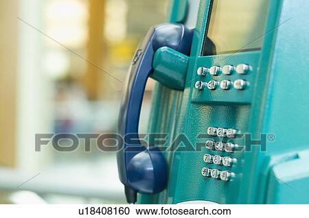 Stock Image - Close-up of a pay phone. Fotosearch