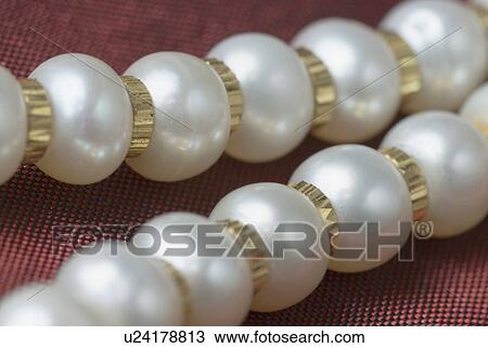 Close-up of a pearl necklace View Large Photo Image Stock Image - Close-up of a pearl necklace. Fotosearch