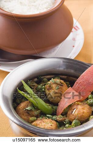Close-up of a potato dish served with white rice in a bowl View Large Photo Image Stock Photography - Close-up of a potato dish served with white rice in a bowl. Fotosearch
