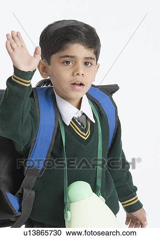 Close-up of a schoolboy waving his hands View Large Photo Image Stock Image - Close-up of a schoolboy waving his hands. Fotosearch