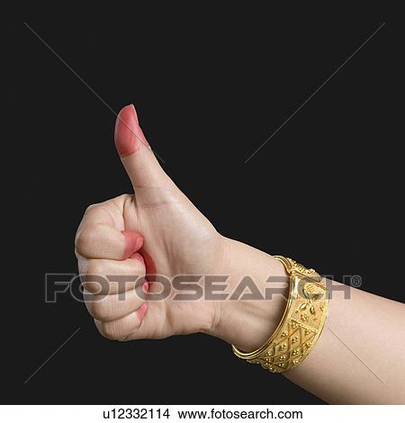 Close-up of a woman's hand making a Bharatnatyam gesture View Large Photo Image Picture - Close-up of a woman's hand making a Bharatnatyam gesture. Fotosearch