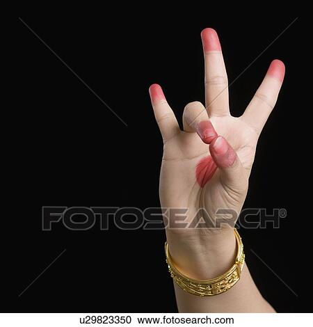 Close-up of a woman's hand making a Bharatnatyam gesture View Large Photo Image Stock Image - Close-up of a woman's hand making a Bharatnatyam gesture. Fotosearch