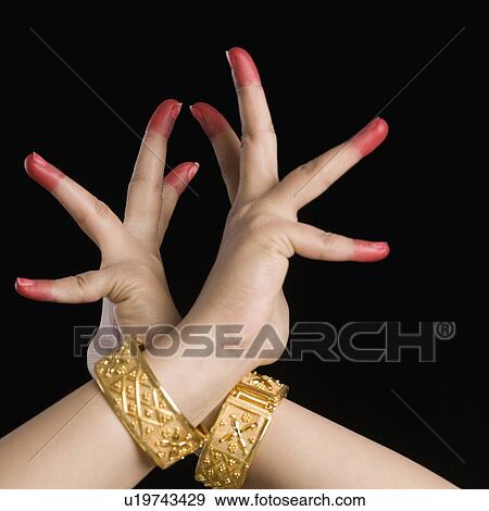 Close-up of a woman's hand making a Bharatnatyam gesture View Large Photo Image Stock Photo - Close-up of a woman's hand making a Bharatnatyam gesture. Fotosearch