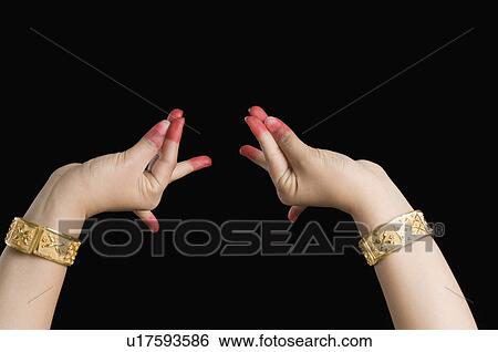 Close-up of a woman's hand making a Bharatnatyam gesture View Large Photo Image Stock Photograph - Close-up of a woman's hand making a Bharatnatyam gesture. Fotosearch