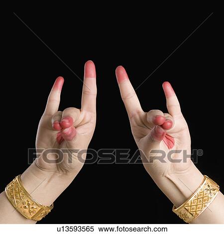 Close-up of a woman's hand making a Bharatnatyam gesture View Large Photo Image Stock Photography - Close-up of a woman's hand making a Bharatnatyam gesture. Fotosearch