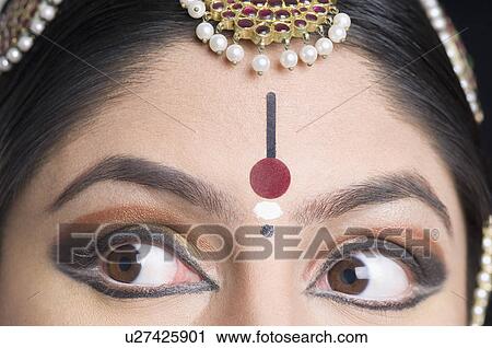 Close-up of a young woman's eyes View Large Photo Image Stock Image - Close-up of a young woman's eyes. Fotosearch