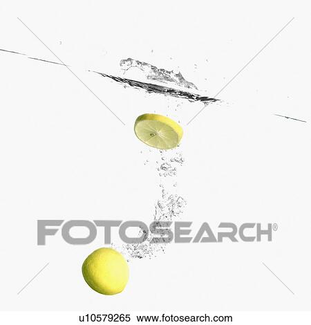 Stock Photography - Close-up of lemons underwater. Fotosearch