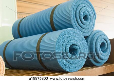 Close-up of rolled up exercise mats View Large Photo Image Stock Image - Close-up of rolled up exercise mats. Fotosearch