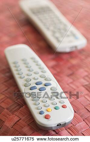 Close-up of two remote controls View Large Photo Image Stock Photography - Close-up of two remote controls. Fotosearch