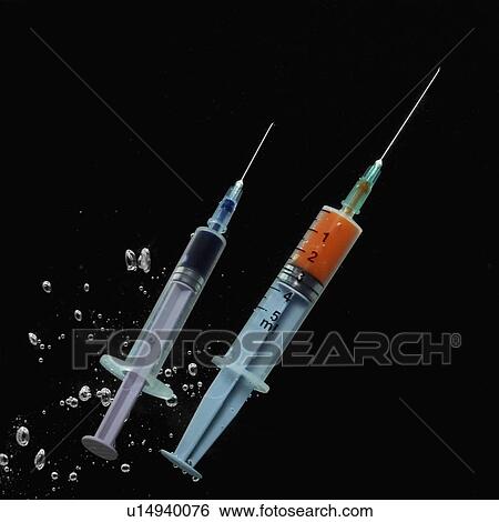 Close-up of two syringes View Large Photo Image Stock Photograph - Close-up of two syringes. Fotosearch