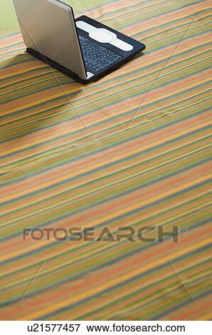 Stock Photo - High angle view of a laptop. Fotosearch