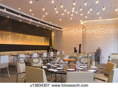 Stock Photo - Interiors of a restaurant. Fotosearch