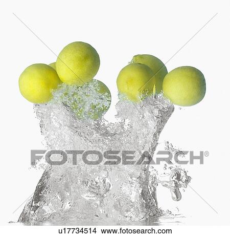 Lemons splashing on water View Large Photo Image Picture - Lemons splashing on water. Fotosearch