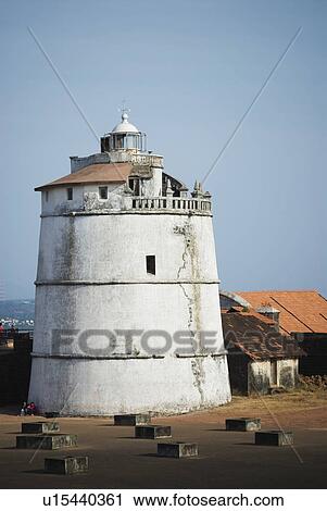 Lighthouse at a fort, Fort Aguada, Goa, India View Large Photo Image Stock Image - Lighthouse at a fort, Fort Aguada, Goa, India. Fotosearch