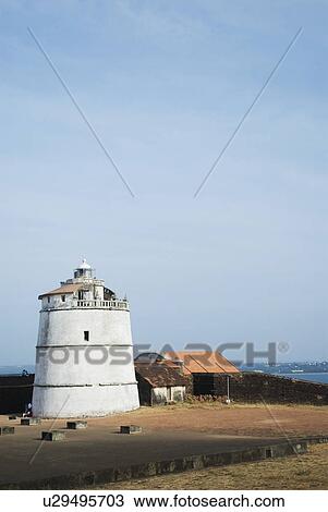 Lighthouse at a fort, Fort Aguada, Goa, India View Large Photo Image Stock Image - Lighthouse at a fort, Fort Aguada, Goa, India. Fotosearch