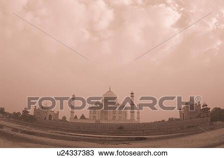 Stock Image - Mausoleum at the riverside, Taj Mahal, Agra, Uttar Pradesh, India. Fotosearch