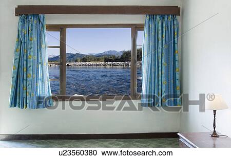 Panoramic view of a river through a window, Jim Corbett National Park, Pauri Garhwal, Uttarakhand, India View Large Photo Image Stock Image - Panoramic view of a river through a window, Jim Corbett National Park, Pauri Garhwal, Uttarakhand, India. Fotosearch