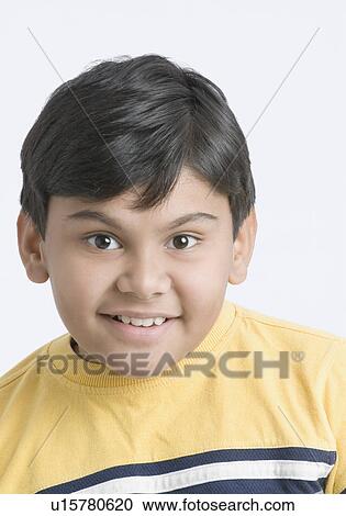 Portrait of a boy smiling View Large Photo Image Stock Image - Portrait of a boy smiling. Fotosearch
