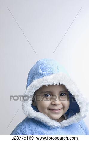 Stock Photo - Portrait of a boy smiling. Fotosearch