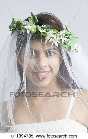 Stock Photography - Portrait of a bride smiling. Fotosearch