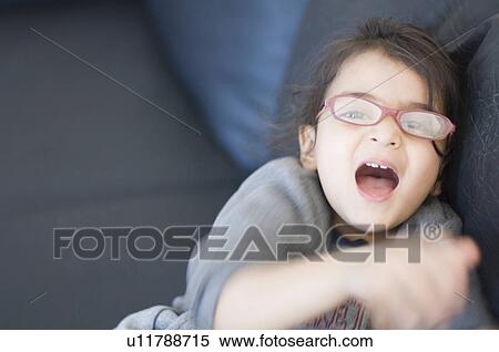 Portrait of a girl laughing View Large Photo Image Stock Photography - Portrait of a girl laughing. Fotosearch