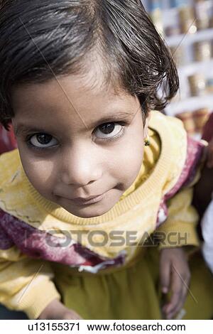 Portrait of a girl looking up View Large Photo Image Stock Image - Portrait of a girl looking up. Fotosearch