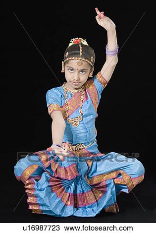 Portrait of a girl performing Bharatanatyam View Large Photo Image Stock Image - Portrait of a girl performing Bharatanatyam. Fotosearch