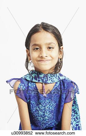 Stock Image - Portrait of a girl smiling. Fotosearch