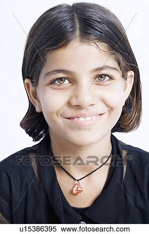Stock Photography - Portrait of a girl smiling. Fotosearch