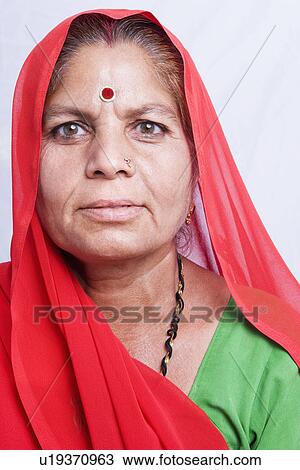 Portrait of a mature woman View Large Photo Image Stock Image - Portrait of a mature woman. Fotosearch