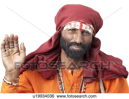 Portrait of a sadhu raising his hand as a blessing View Large Photo Image Stock Photograph - Portrait of a sadhu raising his hand as a blessing. Fotosearch