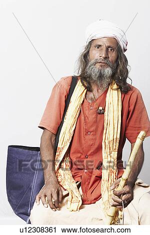 Stock Image - Portrait of a sadhu. Fotosearch