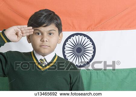 Portrait of a schoolboy saluting in front of an Indian flag View Large Photo Image Stock Image - Portrait of a schoolboy saluting in front of an Indian flag. Fotosearch