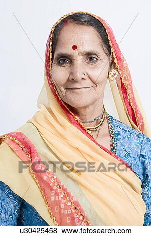 Stock Photo - Portrait of a senior woman smiling. Fotosearch