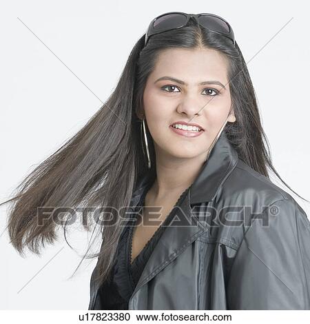 Portrait of a teenage girl smiling View Large Photo Image Stock Image - Portrait of a teenage girl smiling. Fotosearch