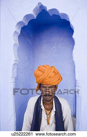 Stock Image - Portrait of a young man wearing a turban, Pushkar, Rajasthan, India. Fotosearch