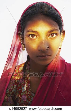 Portrait of a young woman View Large Photo Image Stock Photo - Portrait of a young woman. Fotosearch