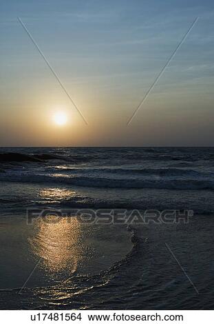 Picture - Sunset over the sea, Colva Beach, Goa, India. Fotosearch