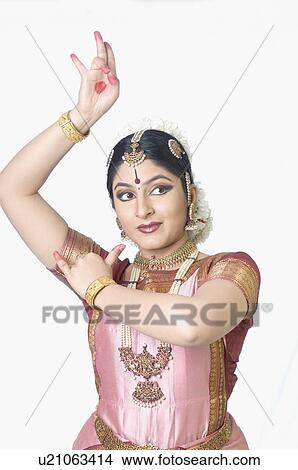 Young woman performing Bharatnatyam View Large Photo Image Picture - Young woman performing Bharatnatyam. Fotosearch