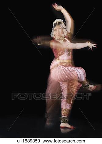 Young woman performing Bharatnatyam View Large Photo Image Stock Photo - Young woman performing Bharatnatyam. Fotosearch